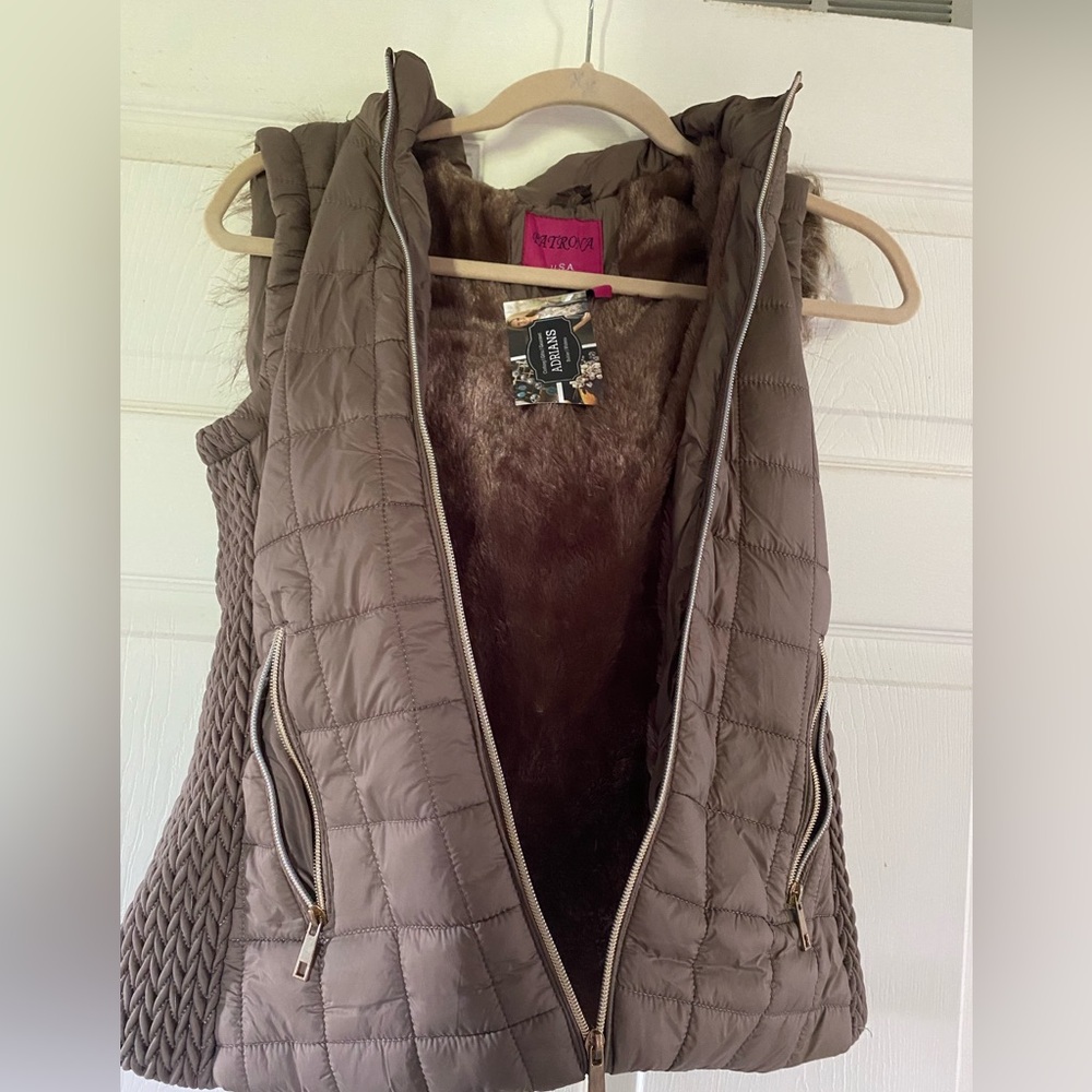 Brand new Fall Vest. Size Small, removable hood.